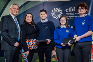 Bursary award winner Colin Reddin with award